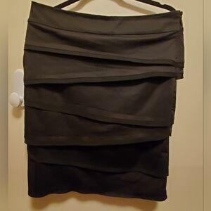 White House Black Market size 10 straight,  Asymmetrically layered Black Skirt